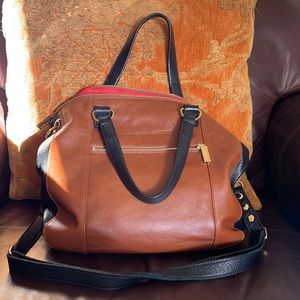 Hammett Carmel brown and black bag in excellent condition, lined in red suede